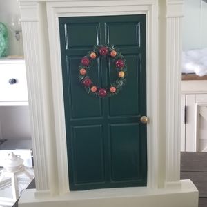 Christmas Carol is green door